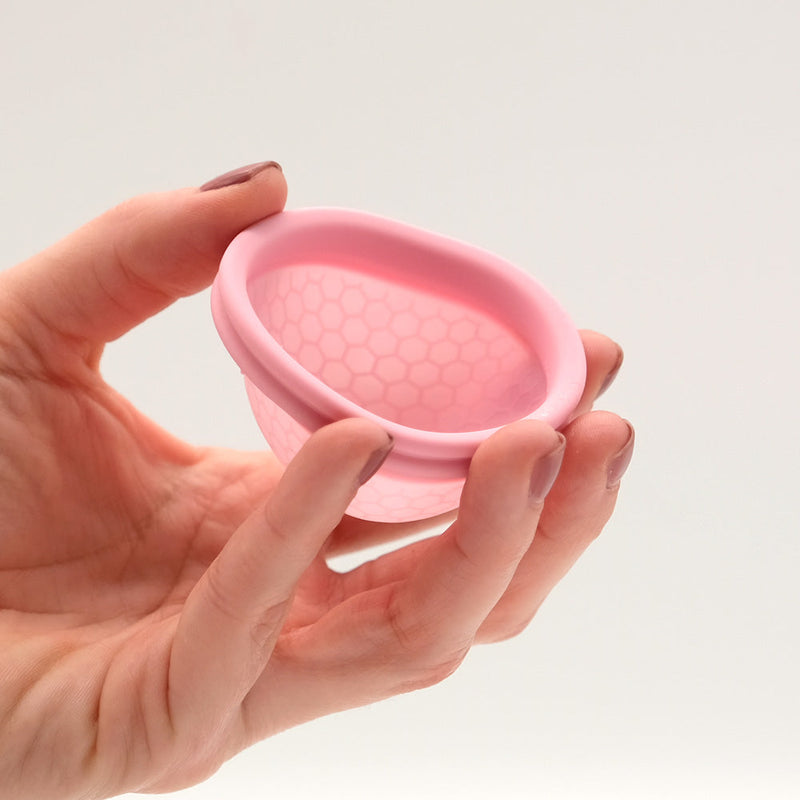 Menstruationstassen und -scheiben